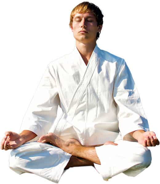 Martial Arts Lessons for Adults in Carrolton TX - Young Man Thinking and Meditating in White