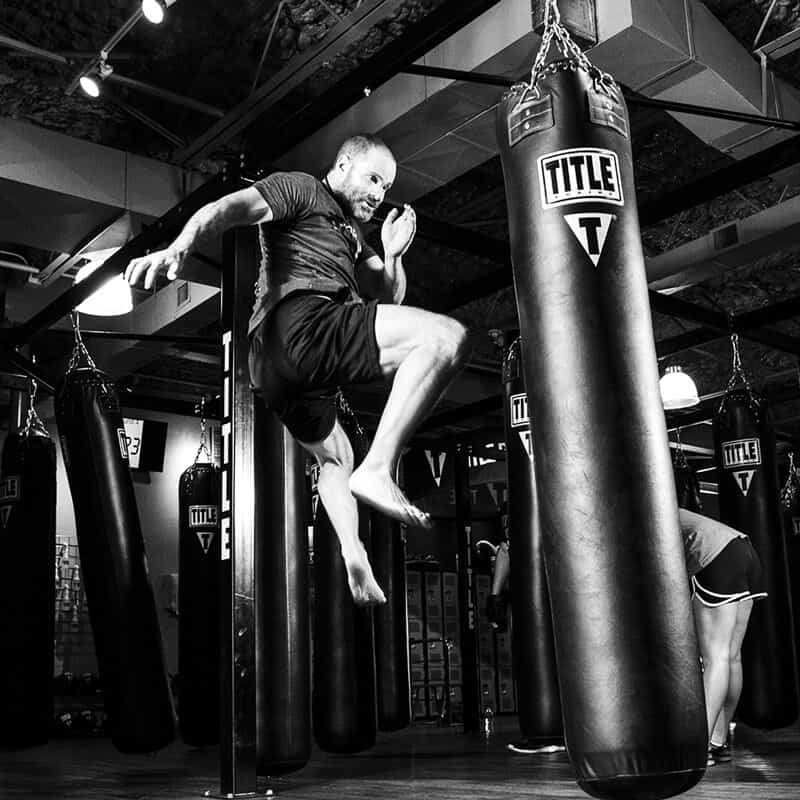 Mixed Martial Arts Lessons for Adults in Carrolton TX - Flying Knee Black and White MMA